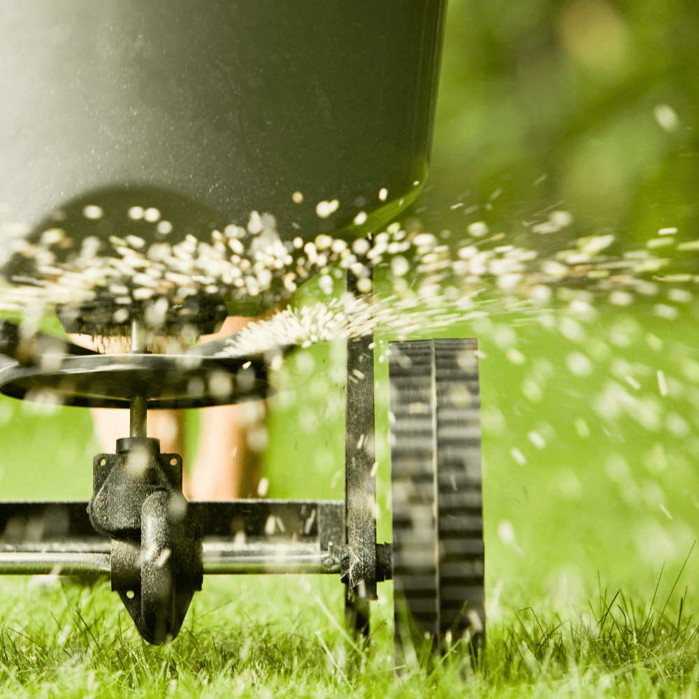 a lawn being fertilized with liquid
